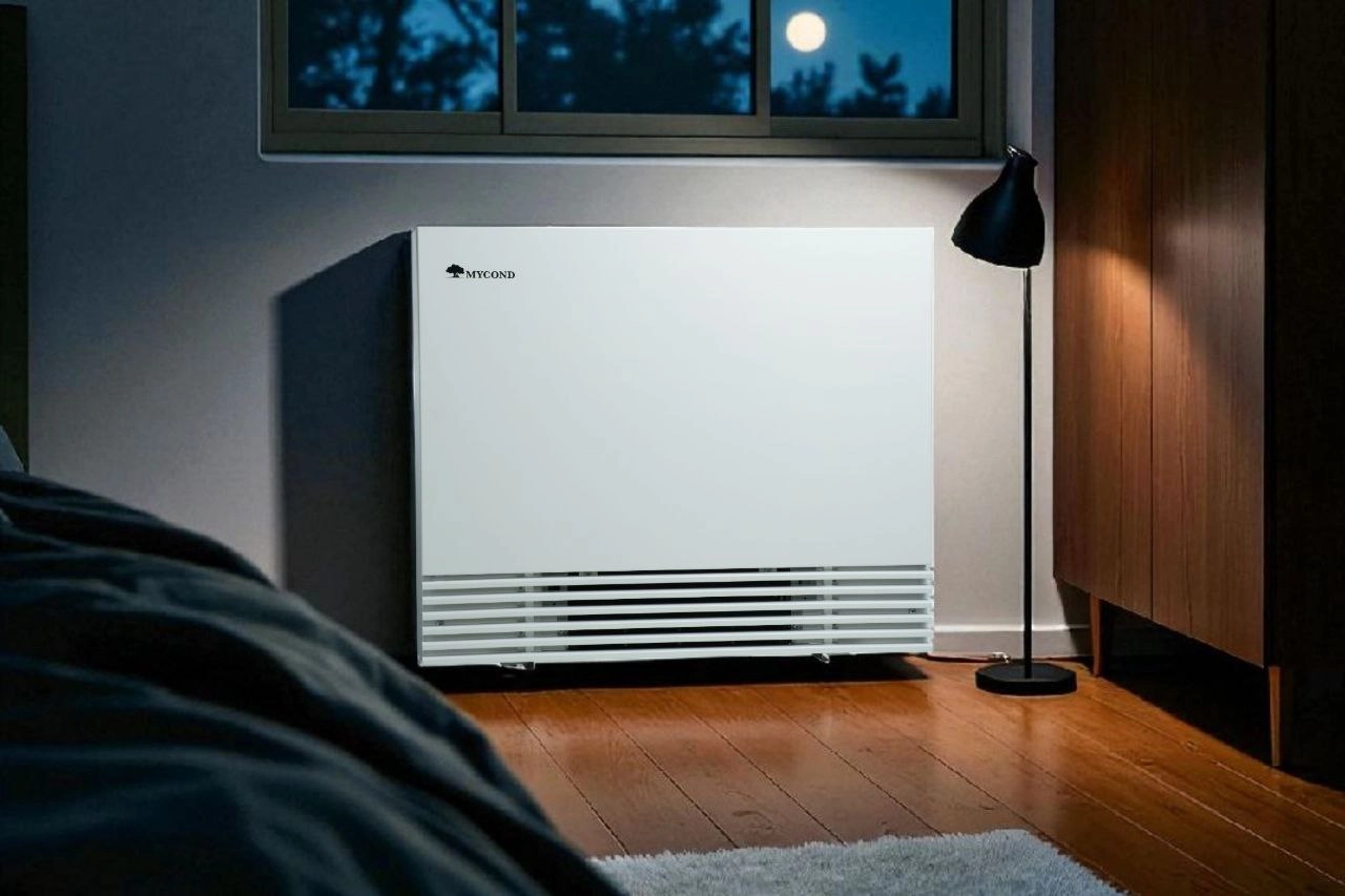 Fan-Coil in einem modernen Schlafzimmer Mycond Serie Silent